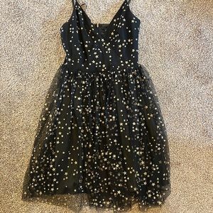 Aakaa black tulle dress with gold accent stars